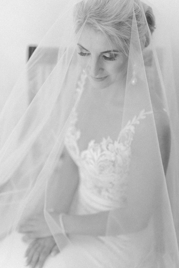 Fine Art wedding photograph of bride under veil